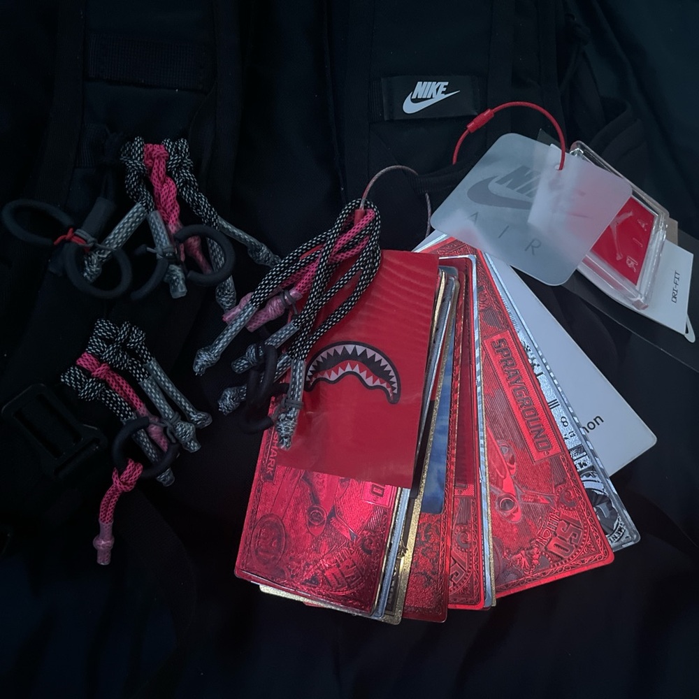 Nike elite and Sprayground limited edition tags